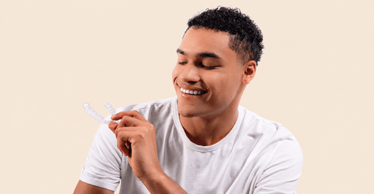 A man holding Caspersmile Clear Retainers