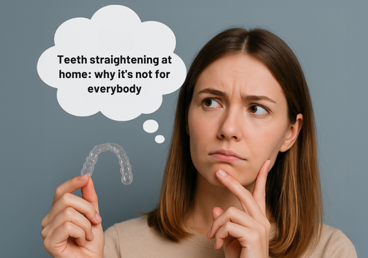 A girl holding aligners and thinking why teeth straightening at home is not for everybody