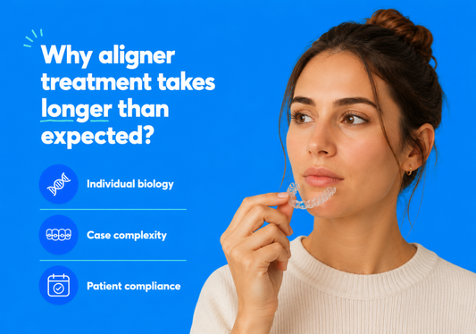 Woman holding a clear aligner with reasons for treatment delays.