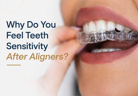 Close-up image of a person fitting a clear dental aligner on their teeth
